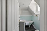 Full bathroom upstairs with soaking tub